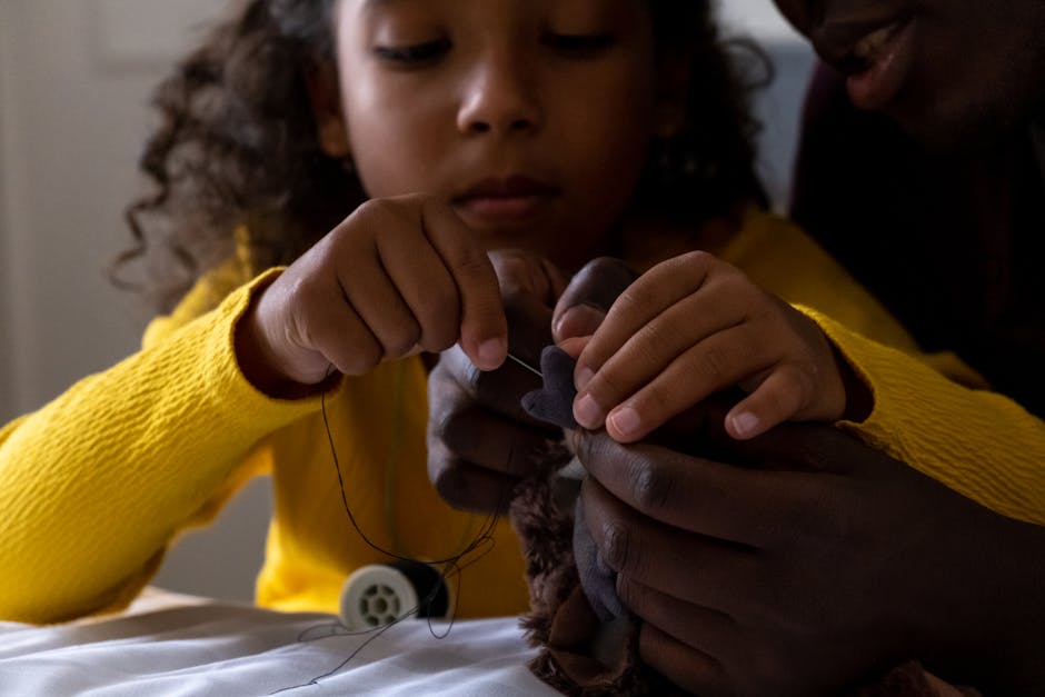 A father and daughter bonding as they sew together indoors, showcasing hands-on creativity.